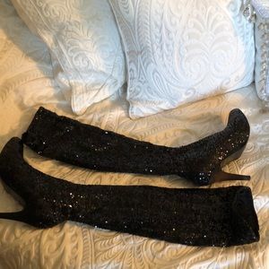 Black sequined knee high boots